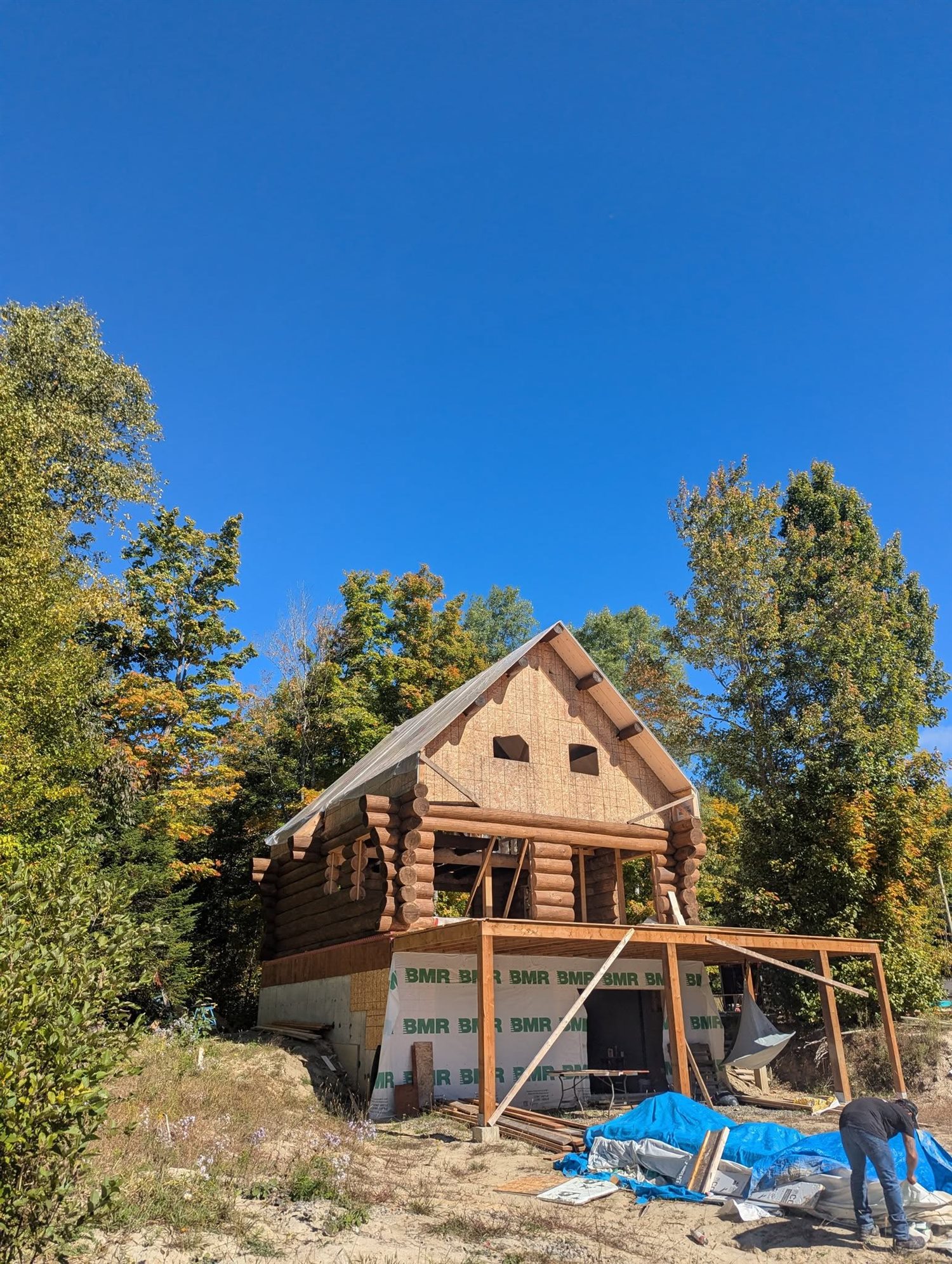 Charpente et transformation d’une maison en bois rond